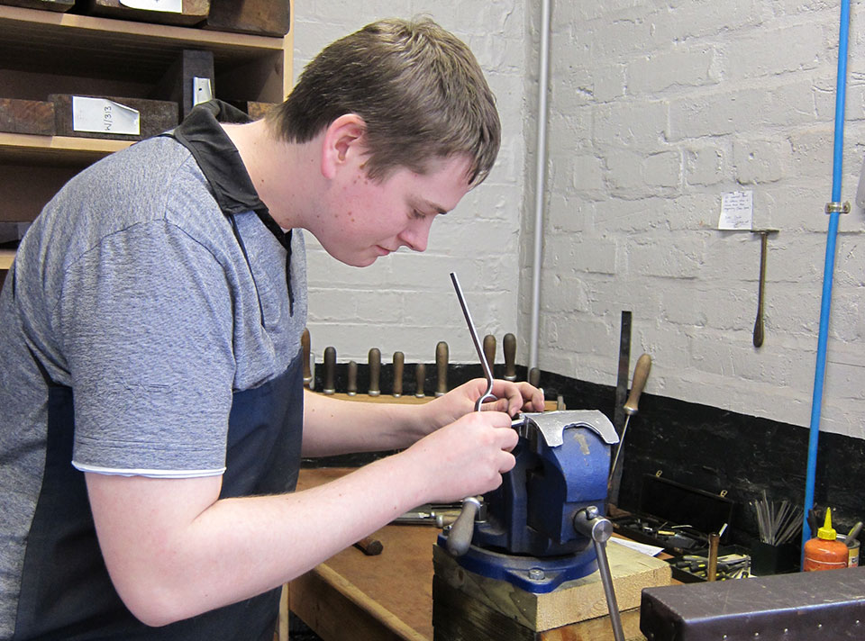 Westley Richards Foreman Stuart Richards as an apprentice in 2014. Young gunmakers may or may not be interested in vintage guns. Many are not.