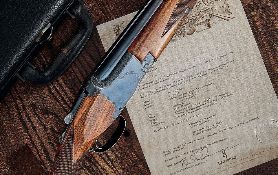 Major Askins 12 gauge Superposed, shown alongside the Browning factory letter - Shipped July 23, 1932, on Invoice # 034510. One can also catch a glimpse of the rare, Pre-war Browning Model “S” hard case in the upper left-hand corner.